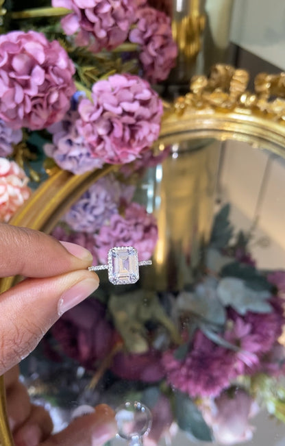 Emerald cut halo promise ring
