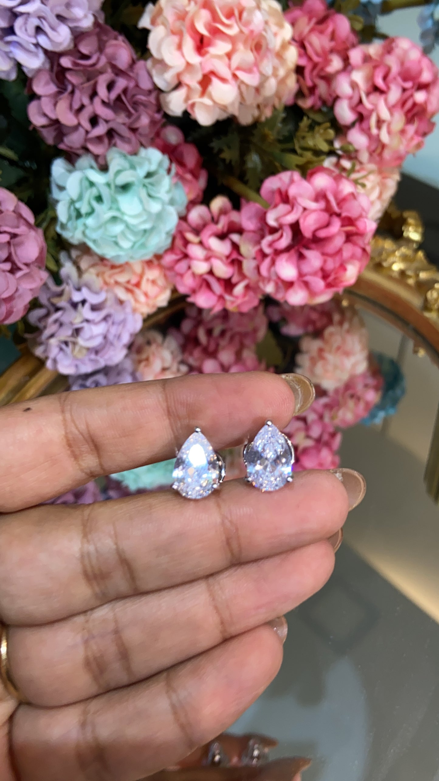 Tear drop pear solitaire earrings