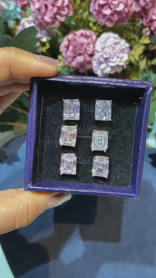 4.5 ct screwback Emerald cut solitaire