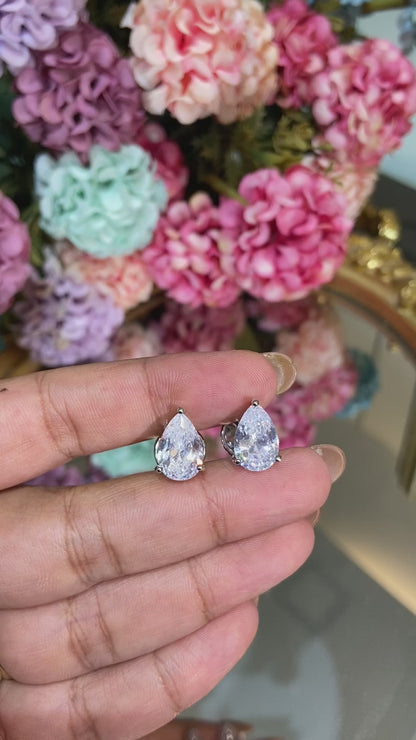 Tear drop pear solitaire earrings