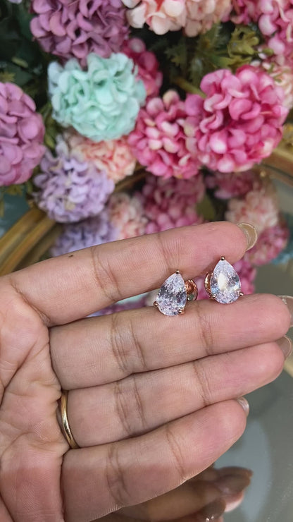 Tear drop pear solitaire earrings