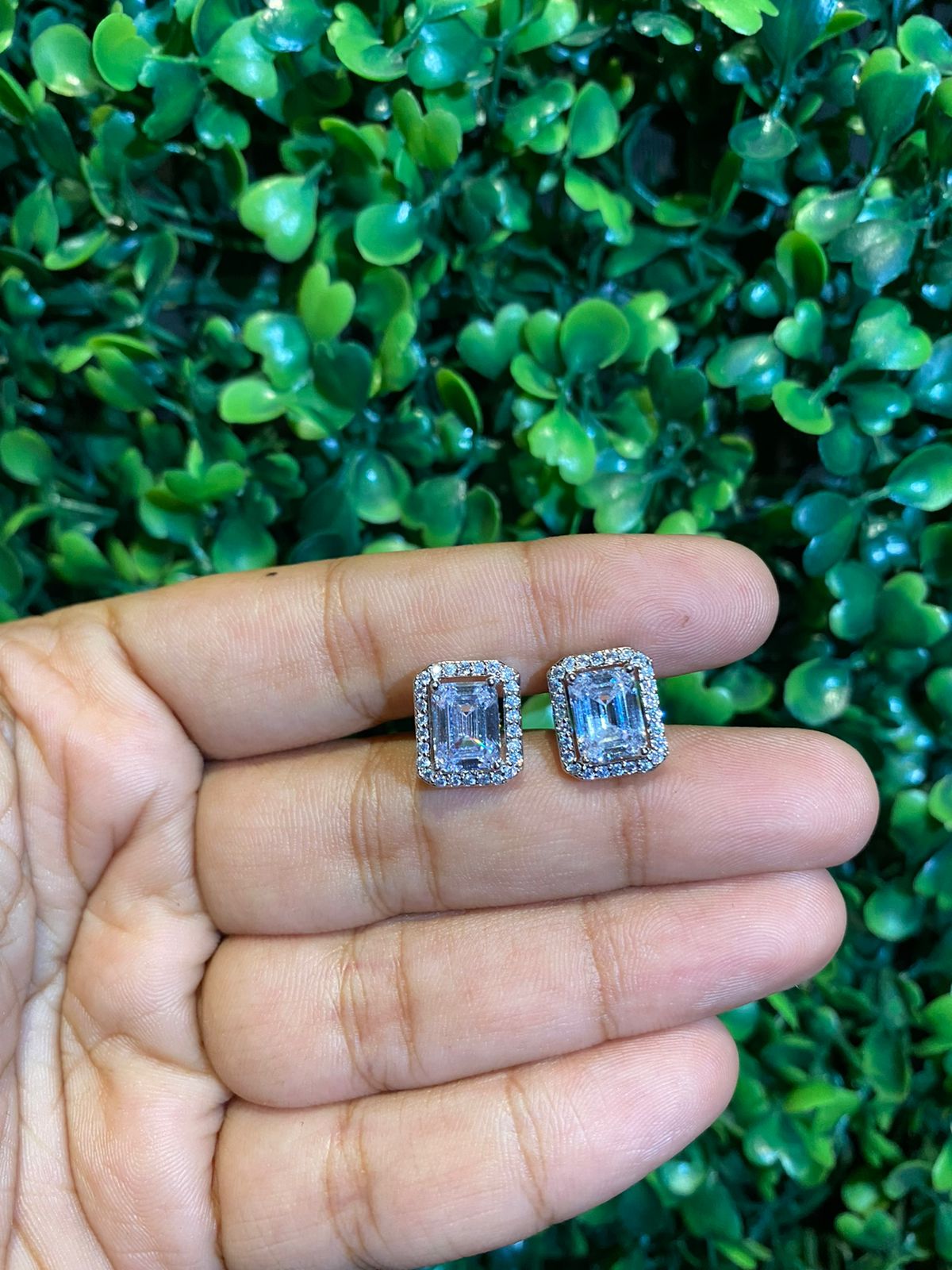 Big emerald cut halo screwback earrings