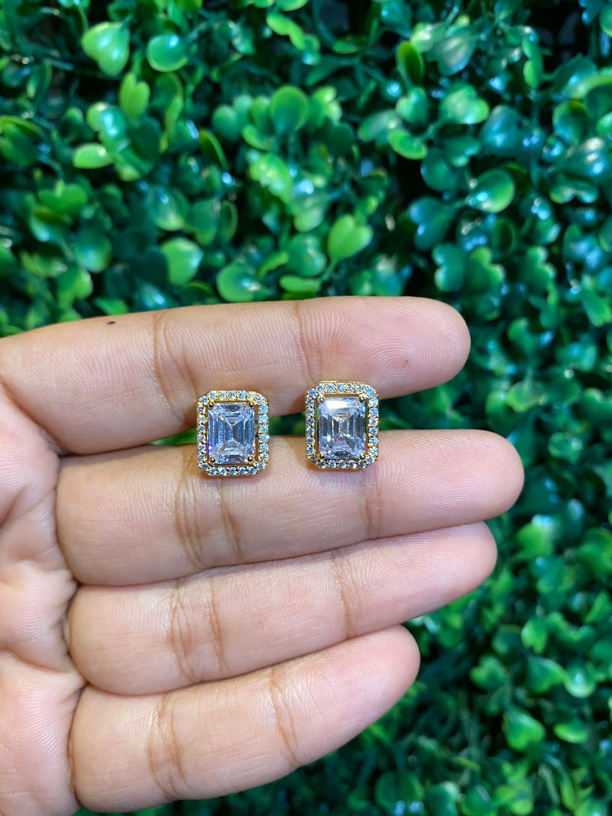 Big emerald cut halo screwback earrings