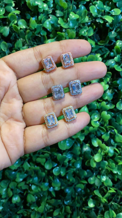 Small emerald cut halo screwback earrings