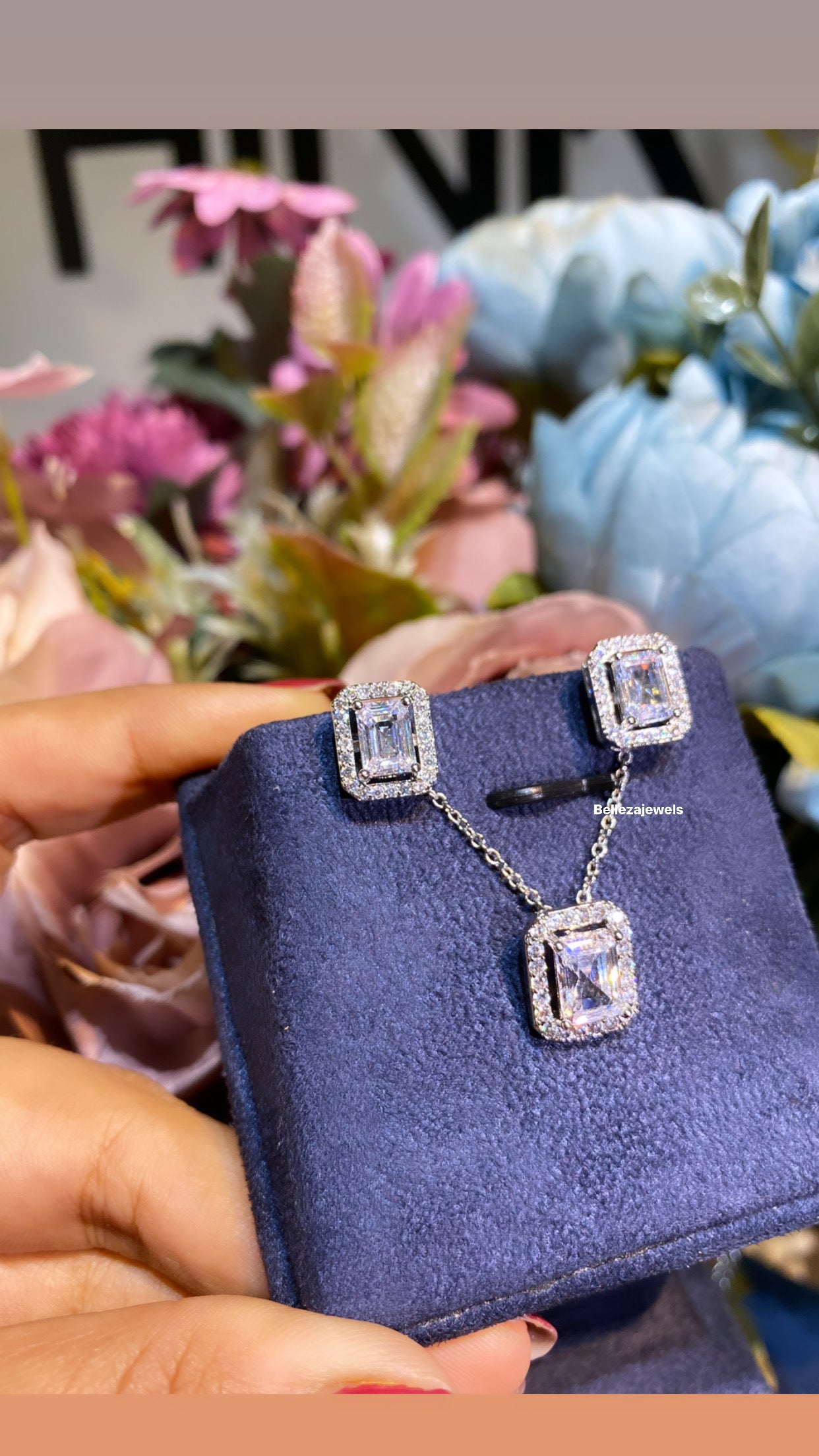 Emerald halo pendant set