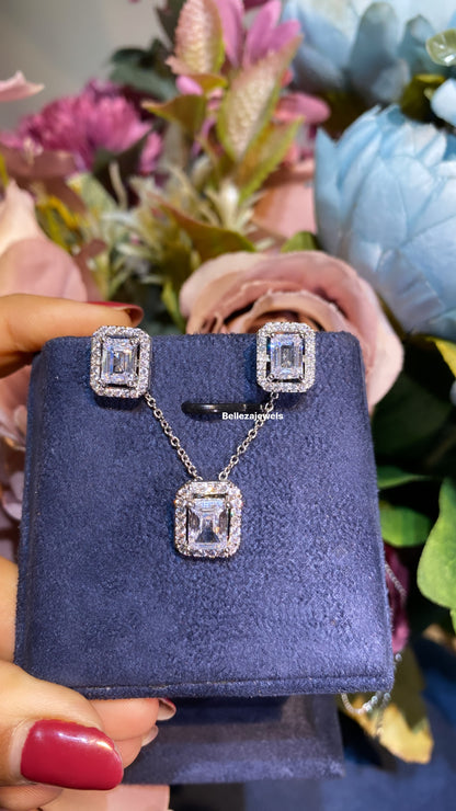 Emerald halo pendant set